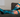 Person resting on a couch wearing OUTWAY teal knee-high compression socks with tree and sunset pattern
